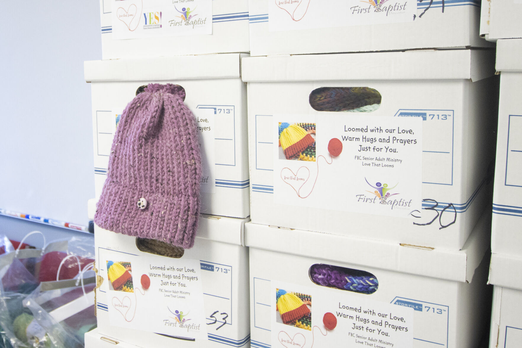 102822-dec-loc-hatdonation_05.JPG